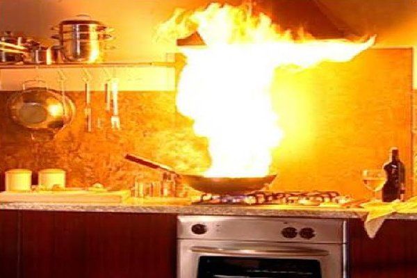 Kitchen fire: Flames erupt from a pan on a stove. Pittsfield, MA.