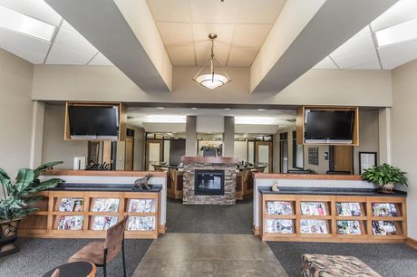 Best family dentist in Lee's Summit, MO and surrounding areas. There is a fireplace in the middle of the room.