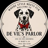 A dalmatian wearing a red bow tie next to a bottle of devil 's parlor perfume