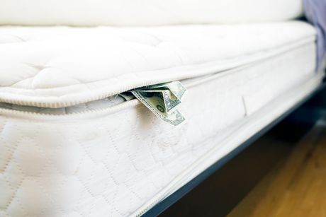 dollar money in the mattress