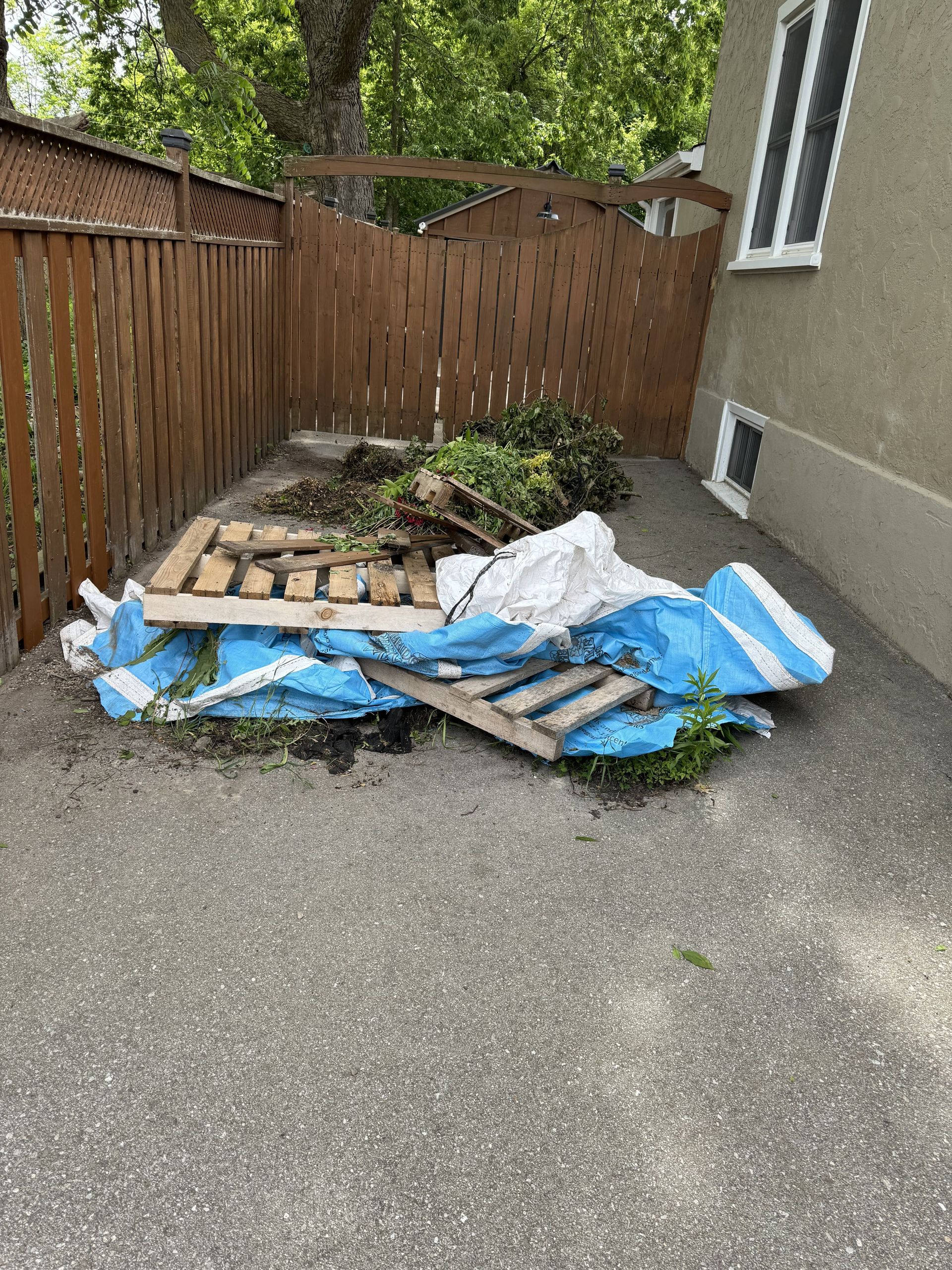 pile of skids and yard waste