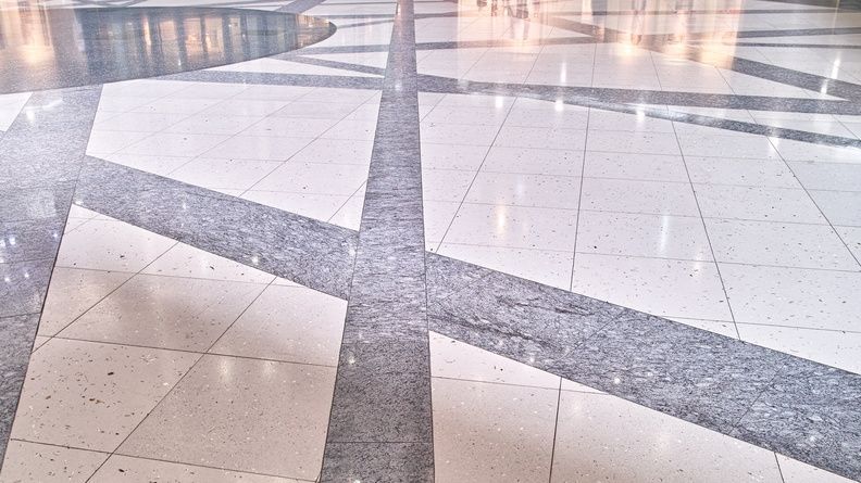 A close up of a clean shining tiled floor.