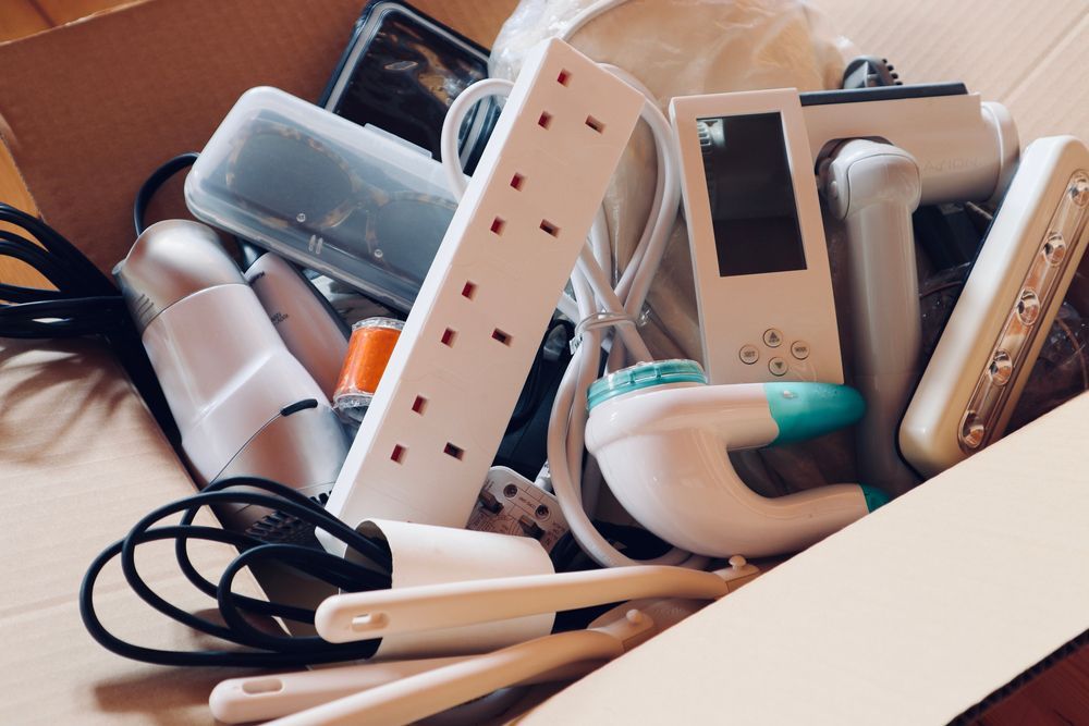 A moving box is filled with items.