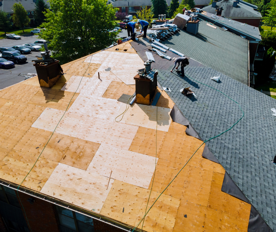 An aerial view of a roof that is being repaired