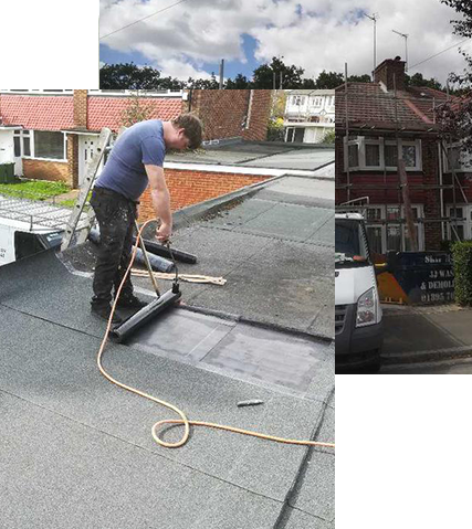 a man is working on the roof of a building