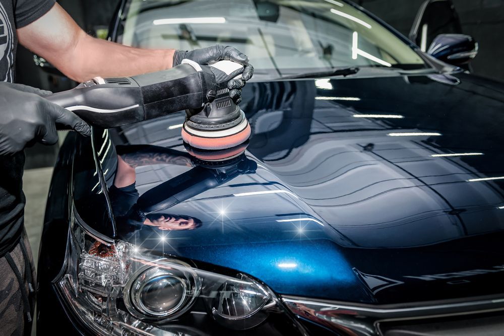 Professional Worker Doing Car Buffing