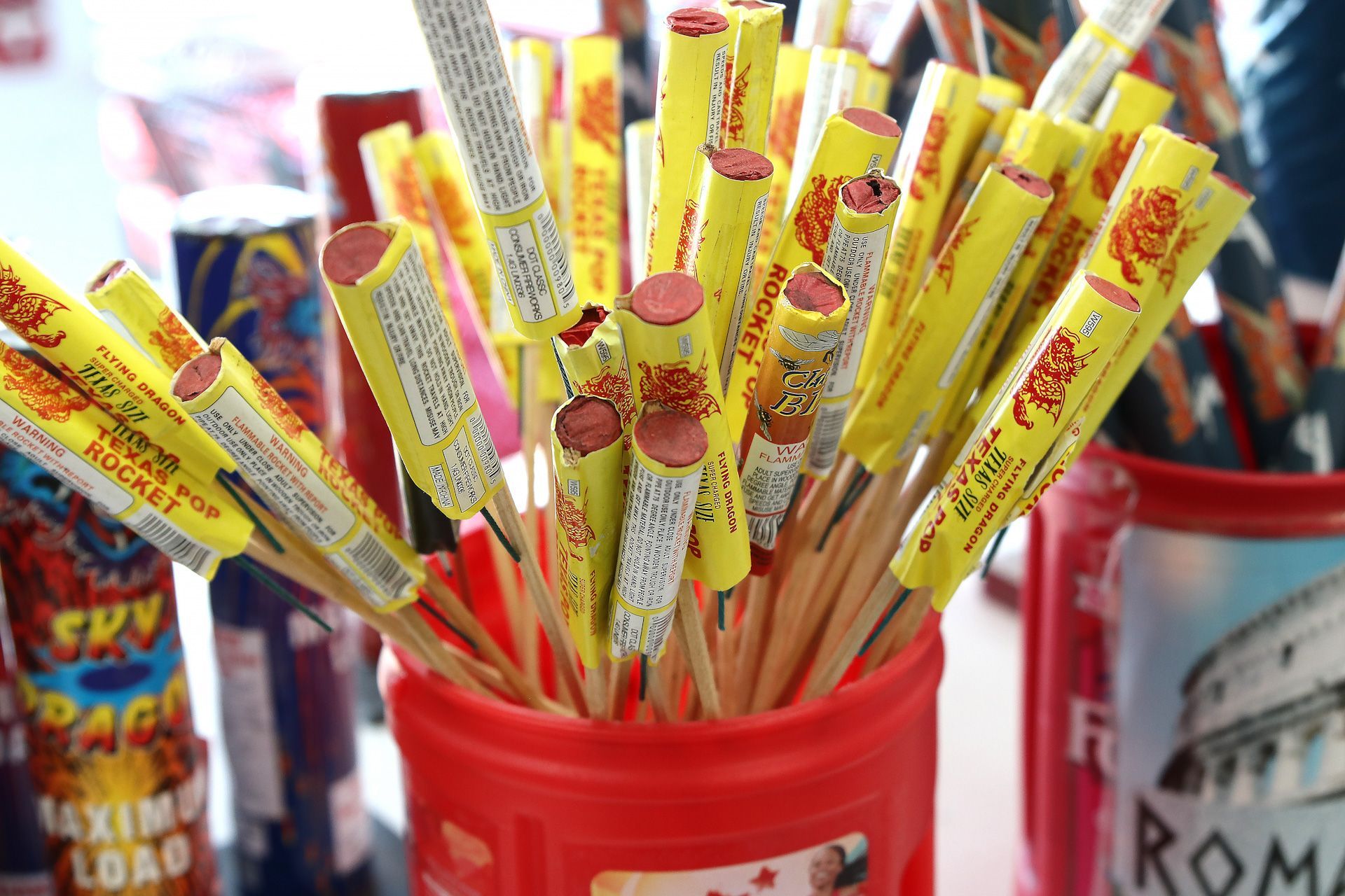 A red bucket filled with fireworks
