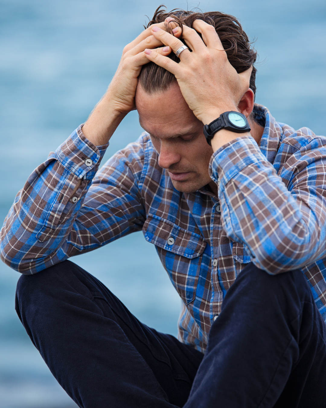 A married man in plaid worrying about sex addiction