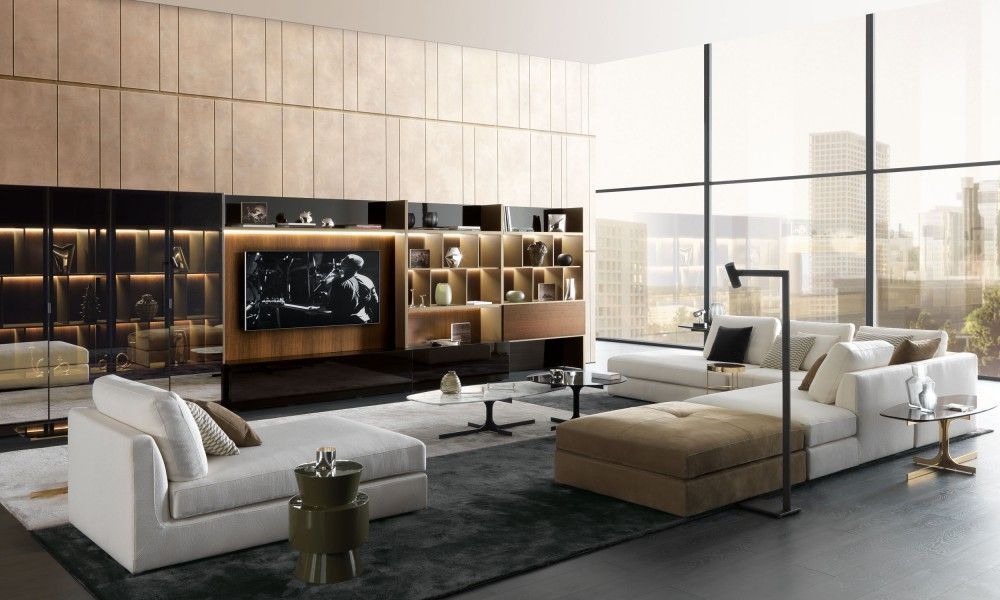 Een woonkamer met een grote hoekbank en een flatscreen-tv