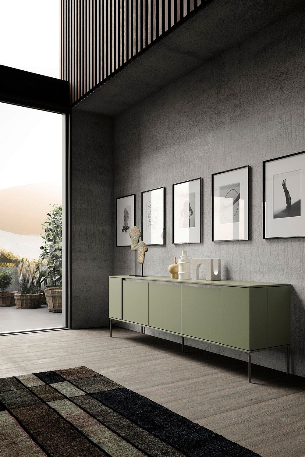 Een woonkamer met een groene ladekast en een vloerkleed.
