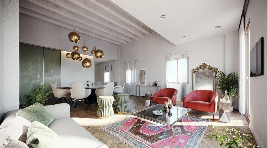 Een woonkamer met een bank, twee stoelen, een tafel en een kleed.