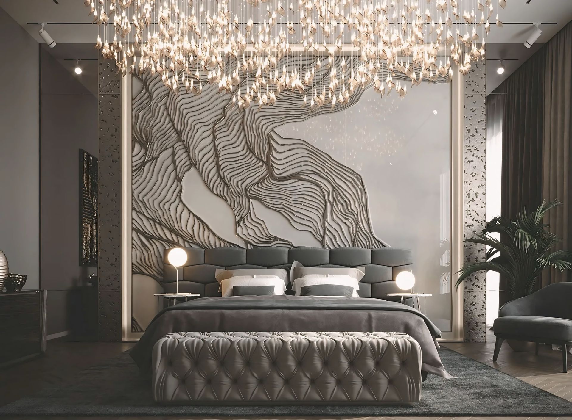 Een slaapkamer met een groot bed en een kroonluchter die aan het plafond hangt