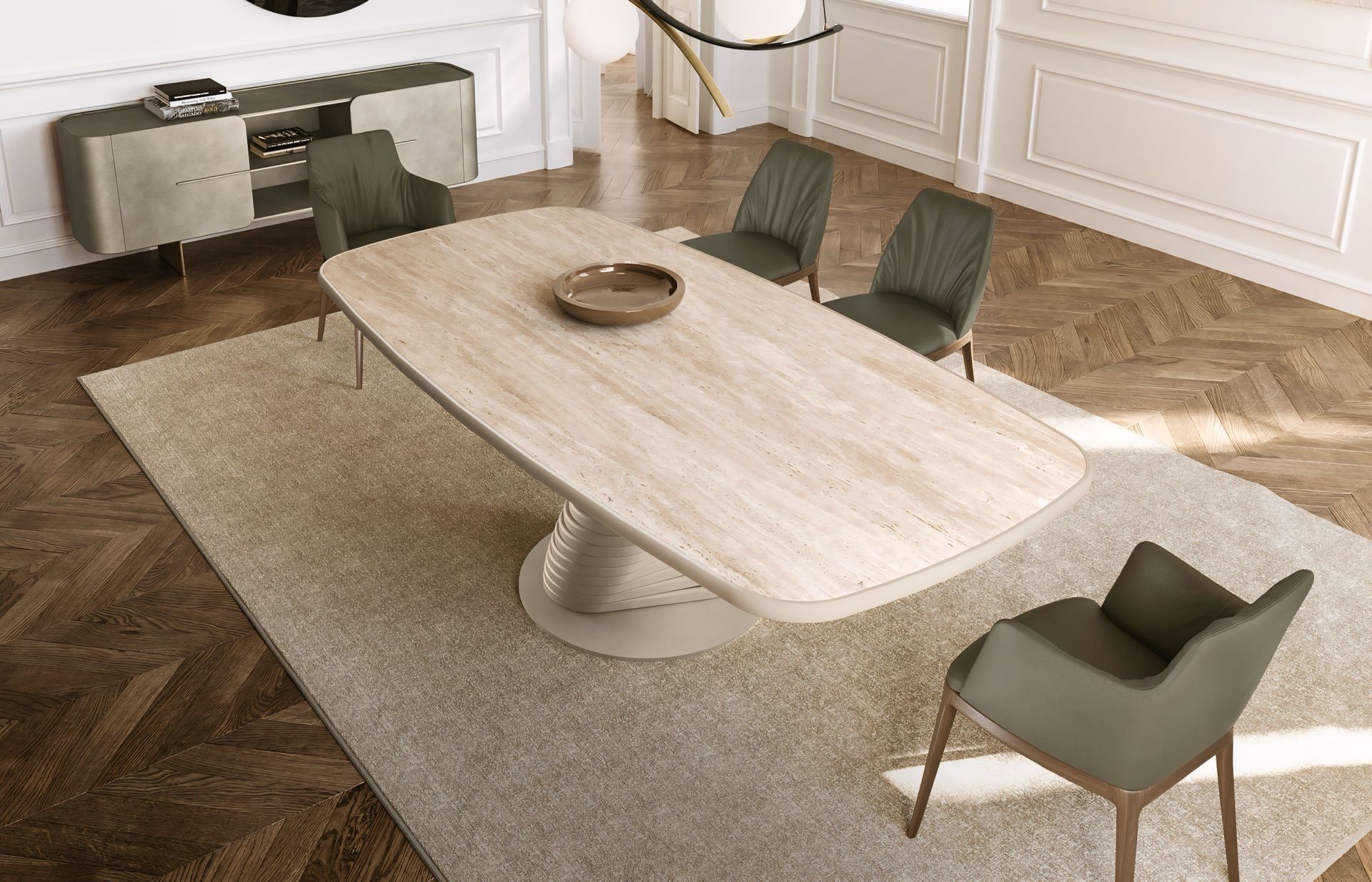 Een eetkamer met een tafel, stoelen en een kleed op de vloer.