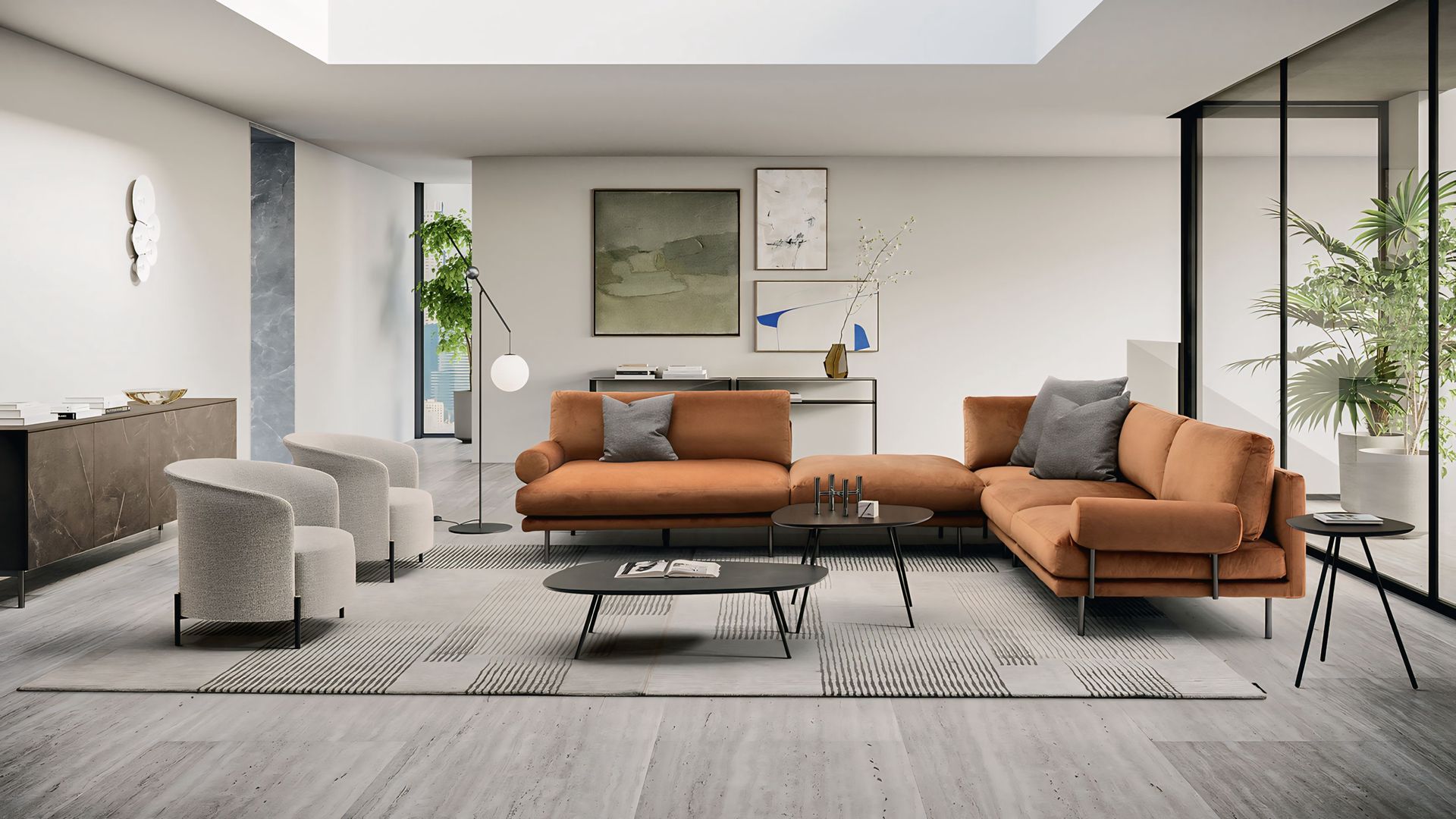 Een woonkamer met een bank, stoelen en een salontafel