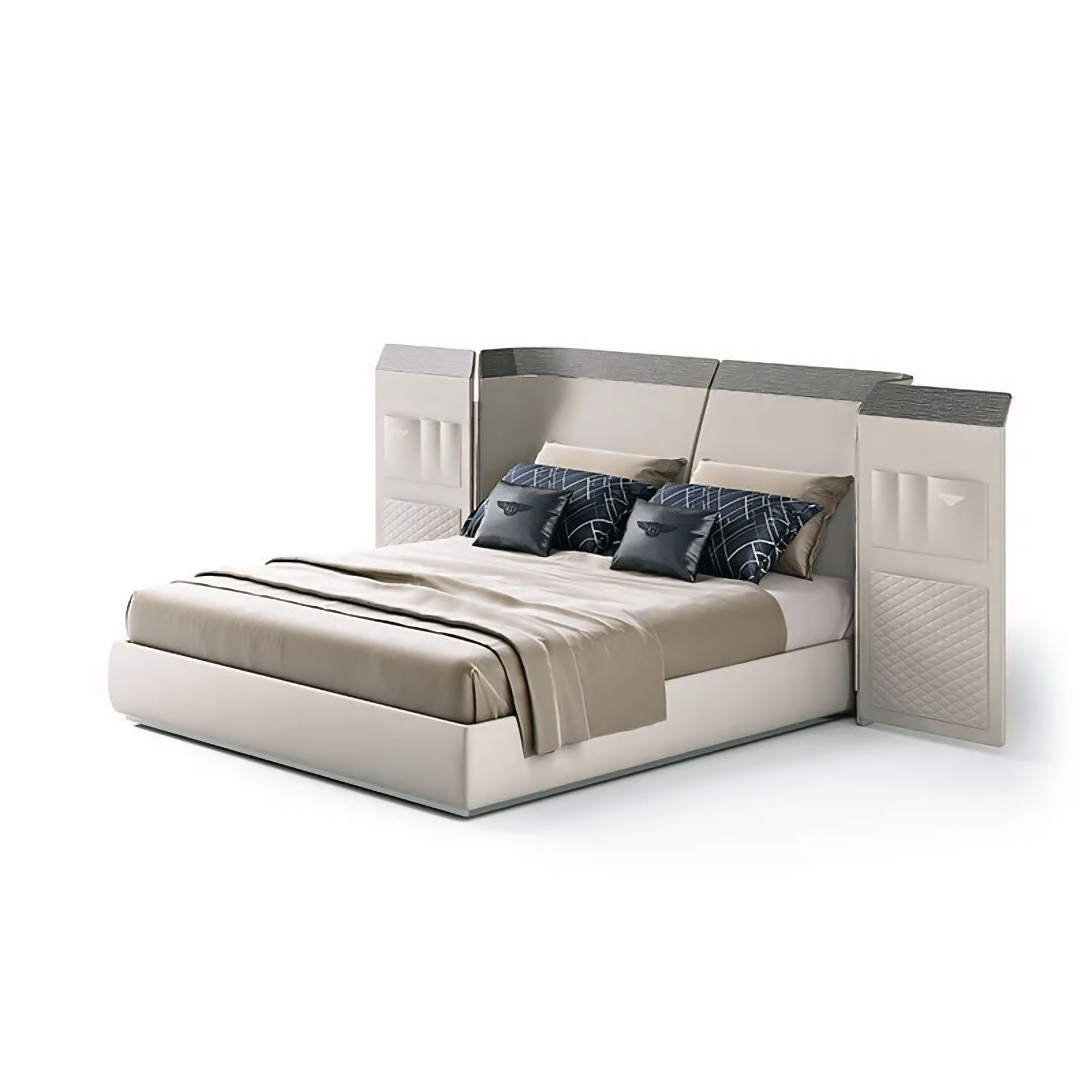 Een bed met een matras en kussens op een witte achtergrond.
