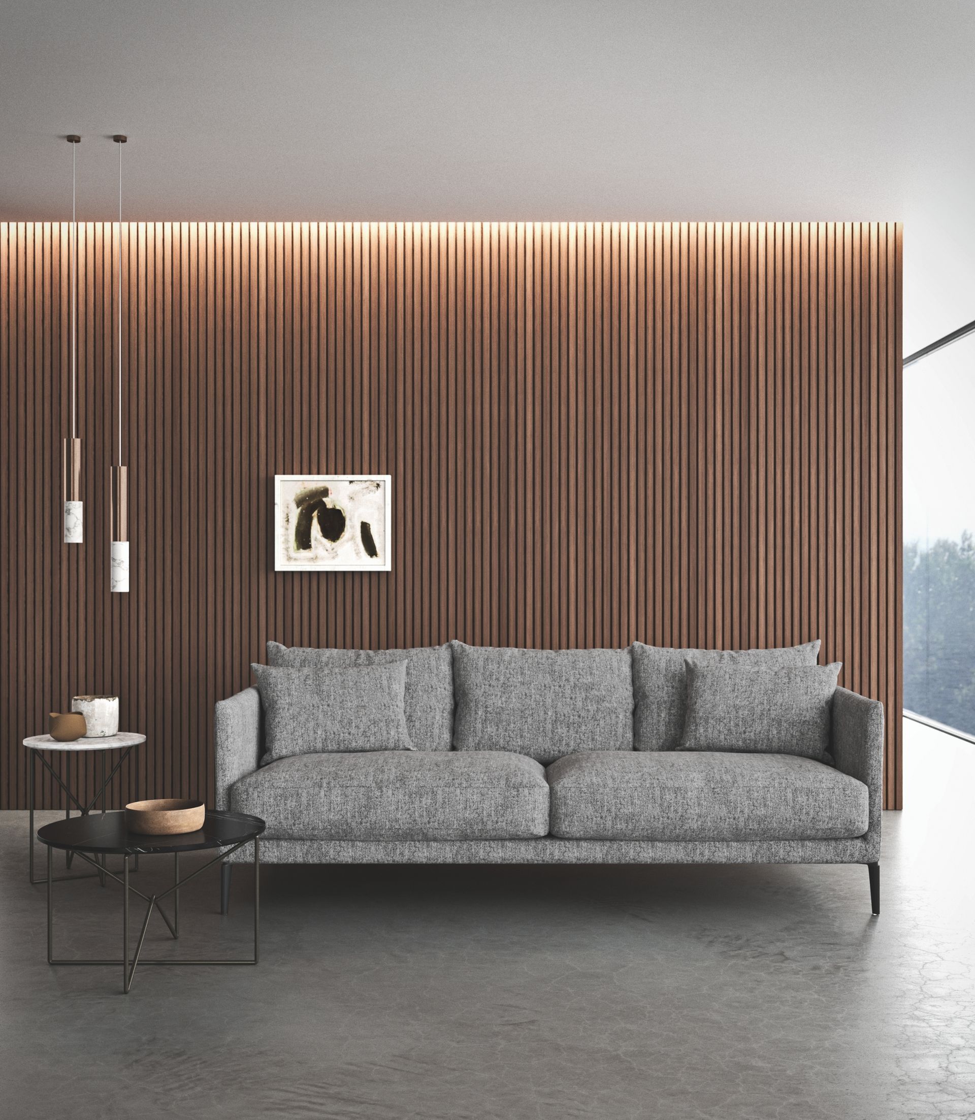 Een woonkamer met een bank en een houten muur