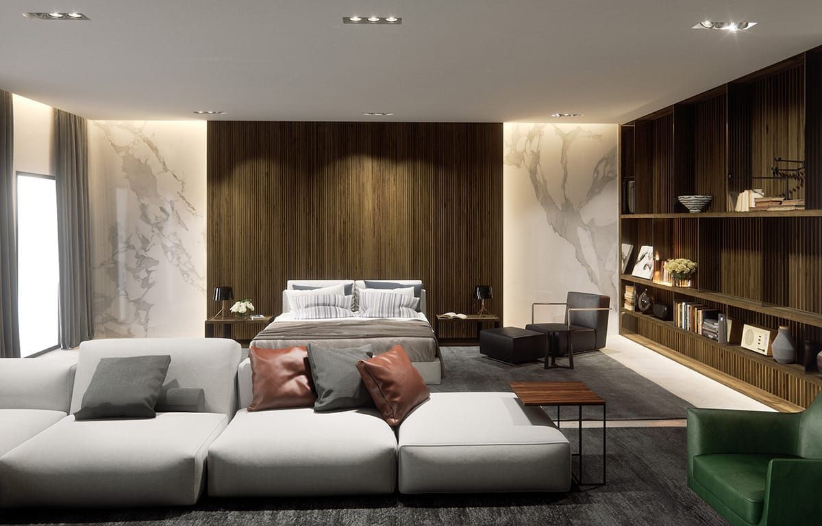 Een woonkamer met een bank, stoelen en een bed.