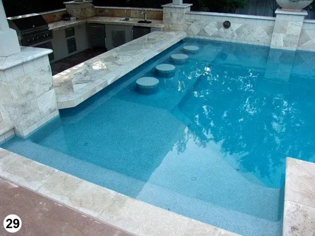 A large swimming pool with the number 29 on the bottom