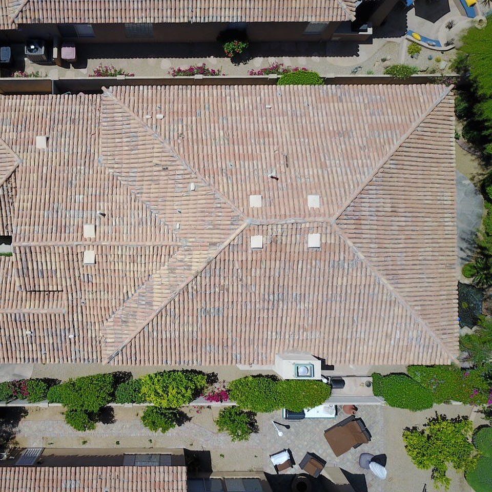 An aerial view of a house with a tiled roof