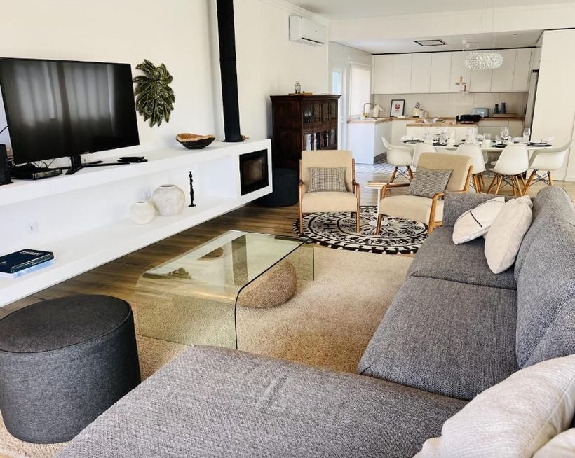 A living room with sofa and television