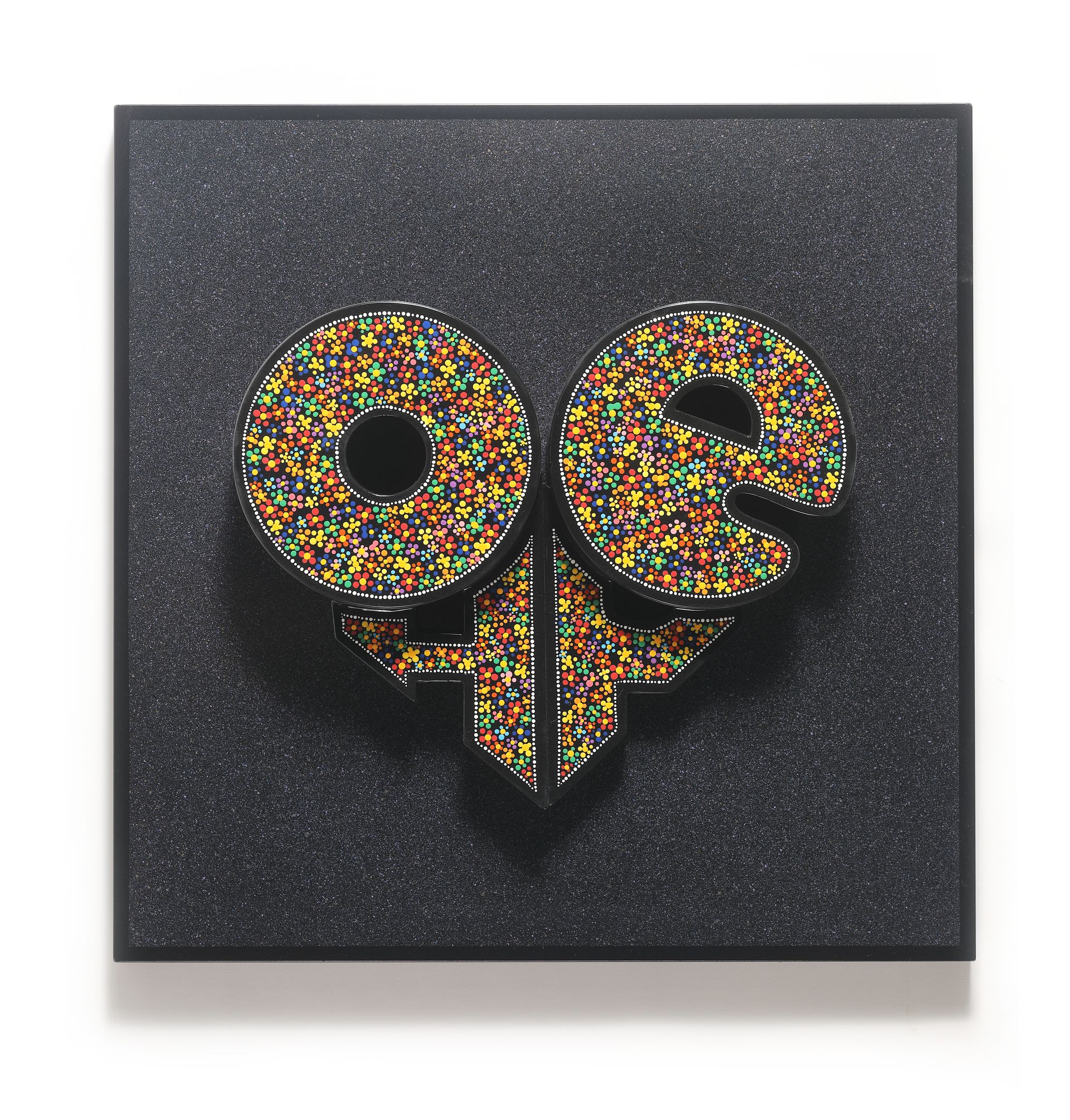 A painting of a heart made of sprinkles on a black background.