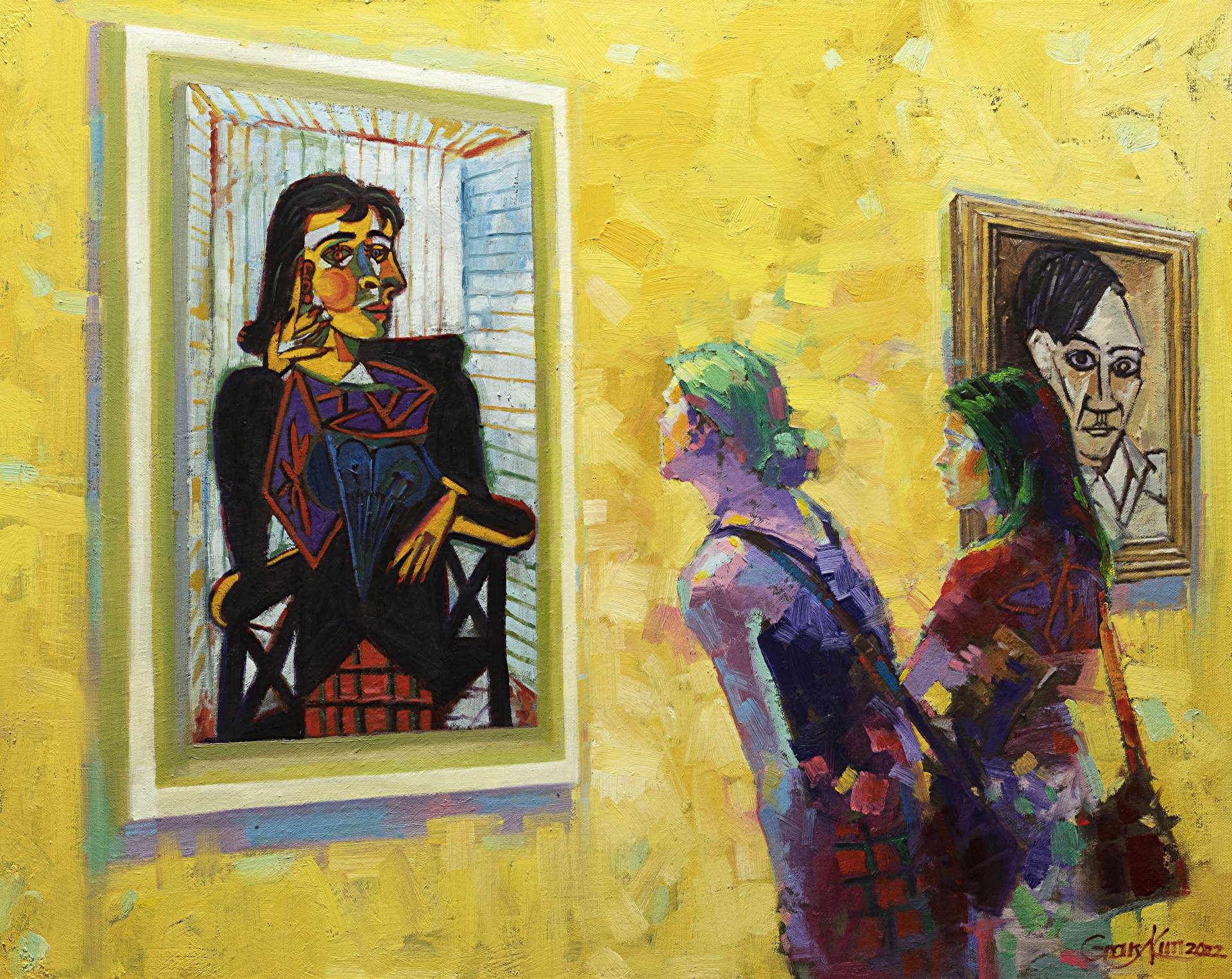 Three people are looking at a painting on a yellow wall.