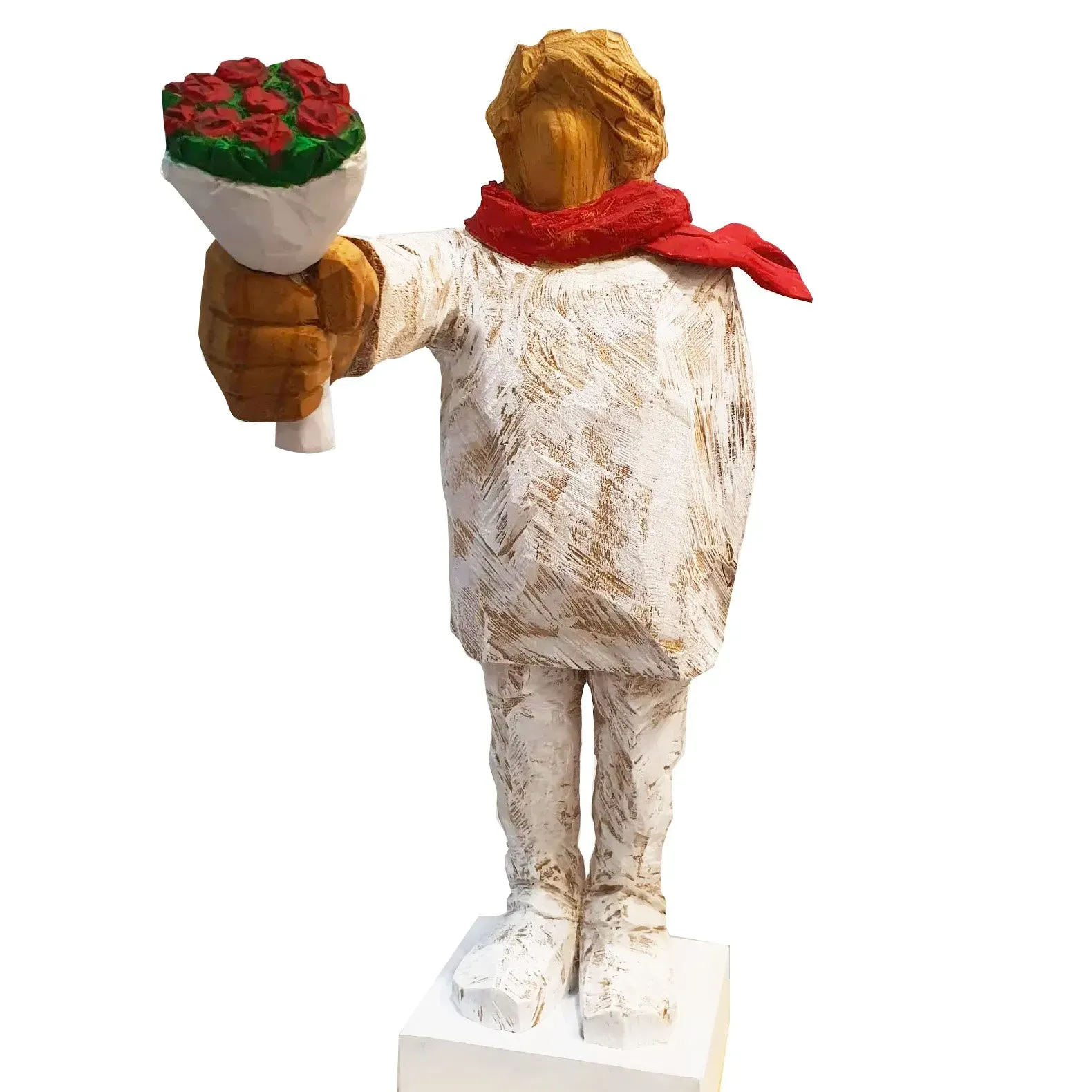 A statue of a person holding a bouquet of flowers.