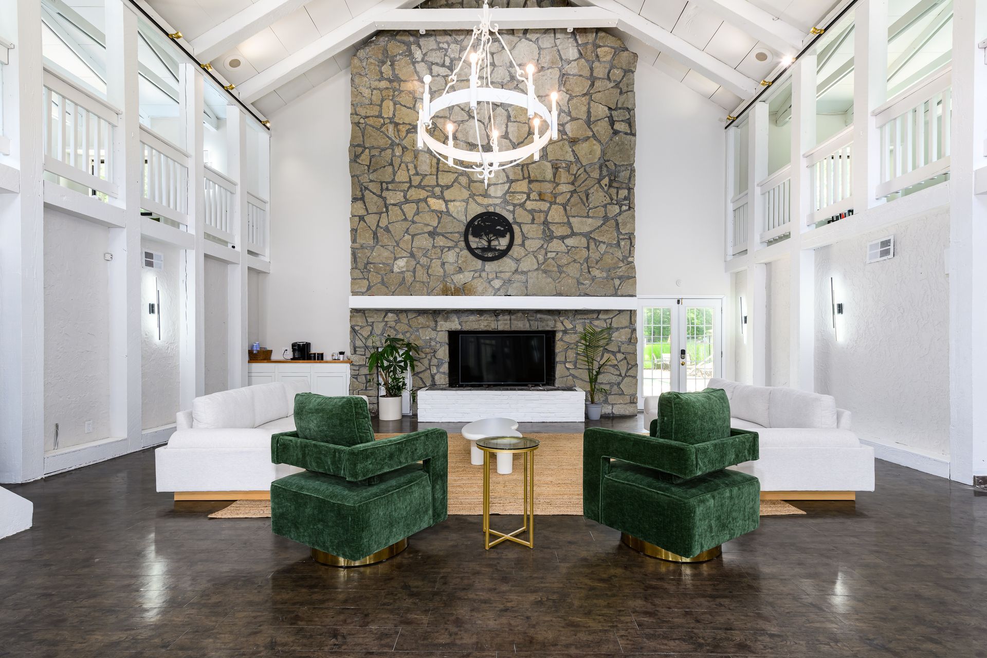 A living room filled with furniture and a fireplace.