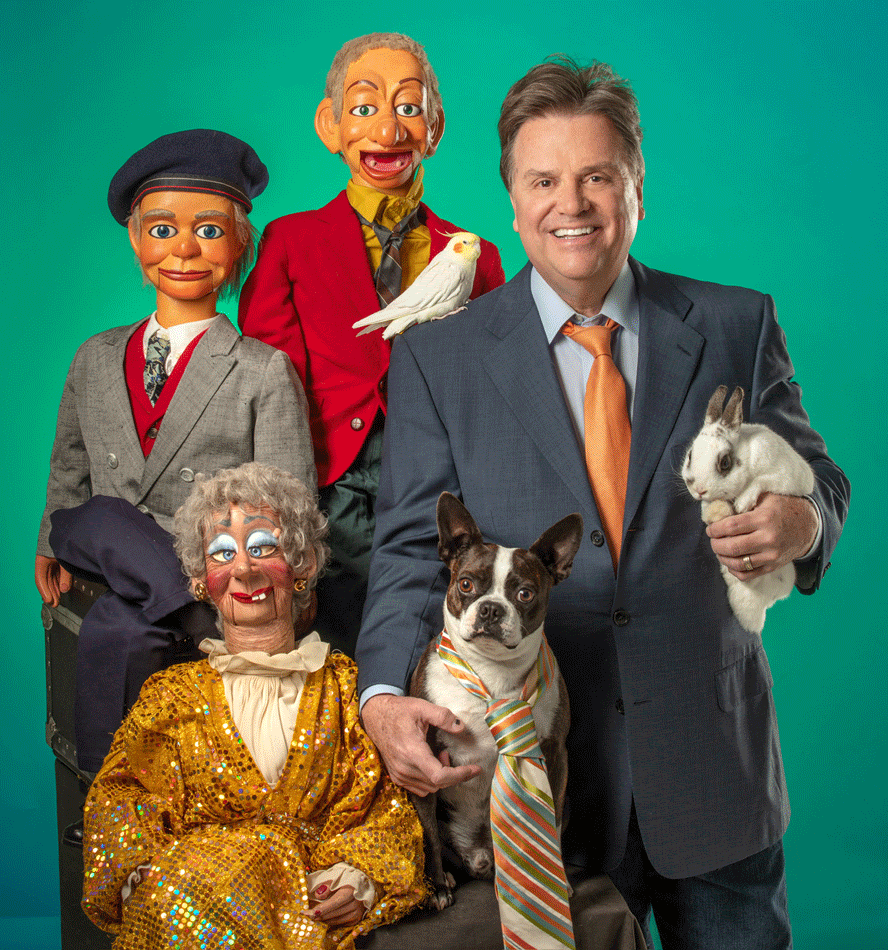 Man struggling to move clock hands forward.