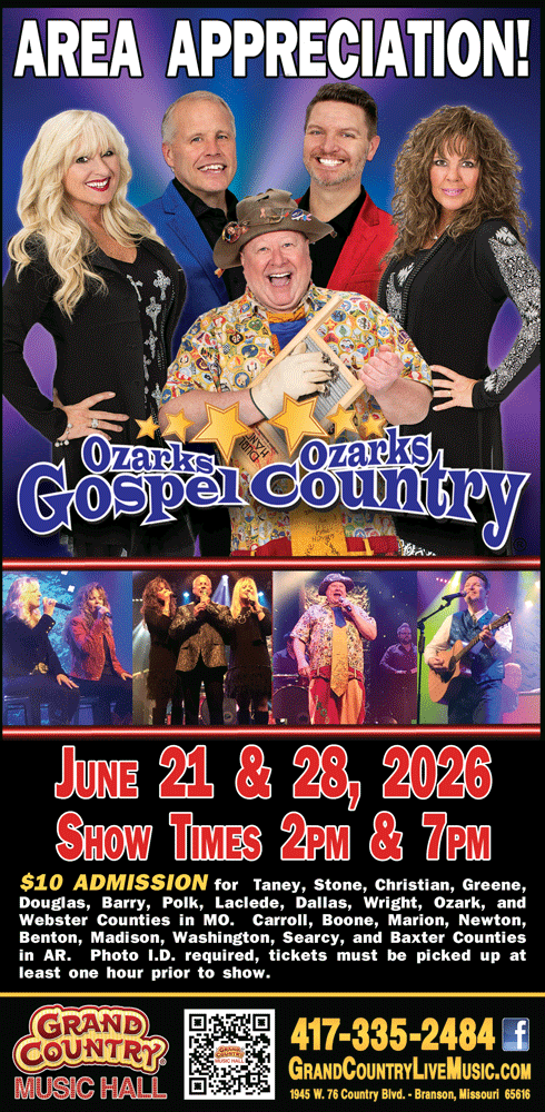 Mike Patrick, General Manager at Grand Country Music Hall, wearing a navy blazer and checkered shirt against a blue background.