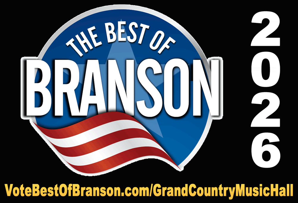 Four performers in western attire promote a country music show in Branson, Missouri, featuring the title Down Home Country.