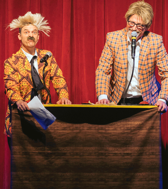 Four performers in western attire promote a country music show in Branson, Missouri, featuring the title Down Home Country.
