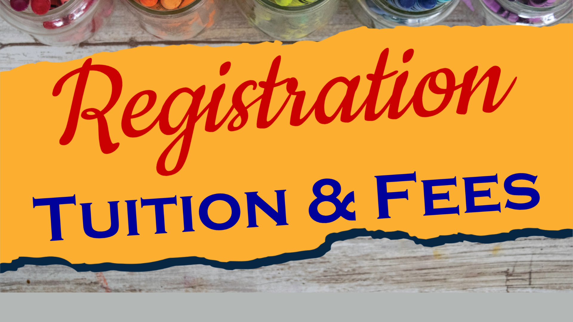 Registration sign with “Tuition & Fees” in red and blue text on a yellow banner.