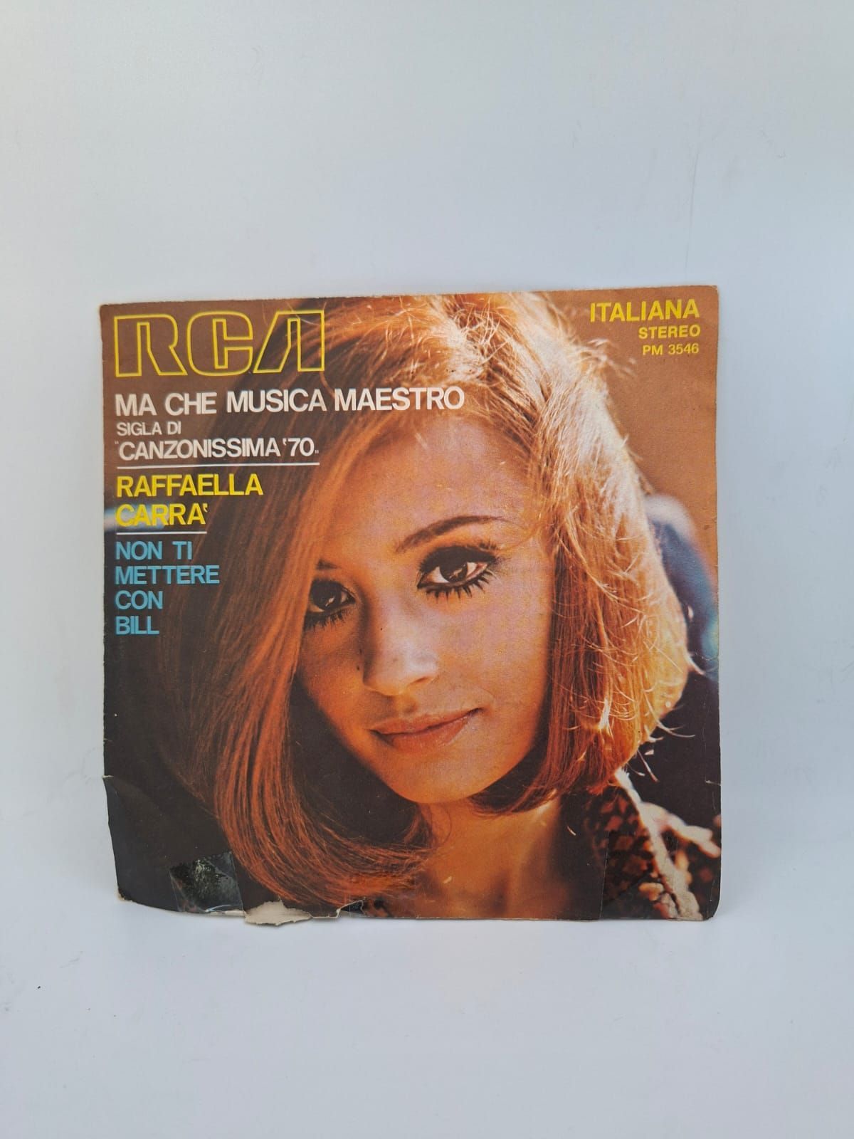 A vintage RCA vinyl record cover featuring a portrait of Raffaella Carrà for the song Ma Che Musica Maestro.
