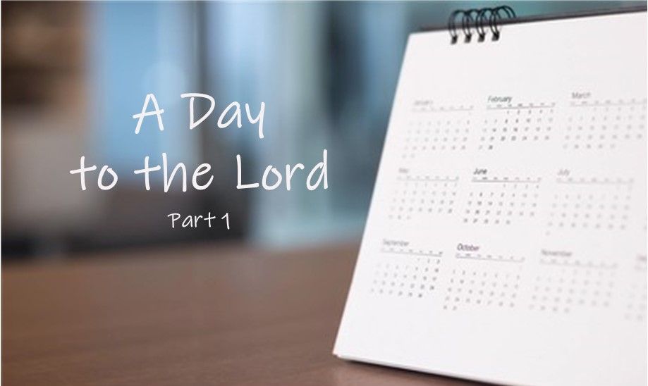 A calendar on a table with the words `` a day to the lord '' written on it.