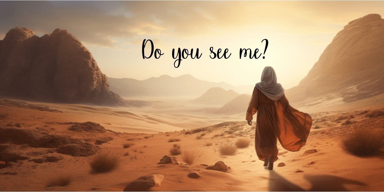 A woman is walking through a desert with mountains in the background.