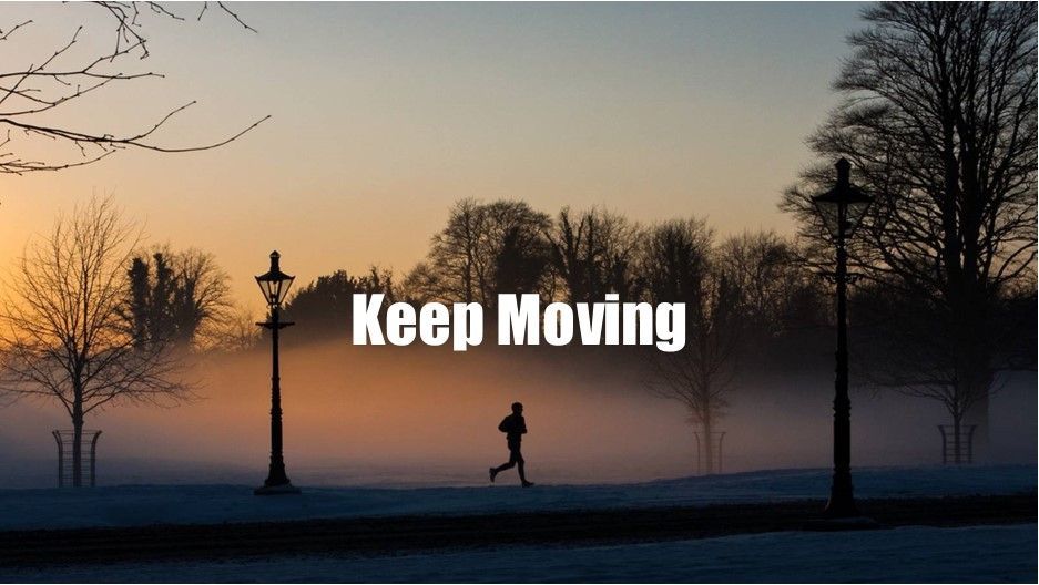 A man is running in a park with the words keep moving above him