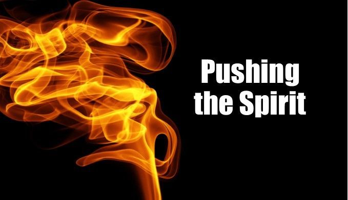A picture of a fire with the words `` pushing the spirit '' written on it.