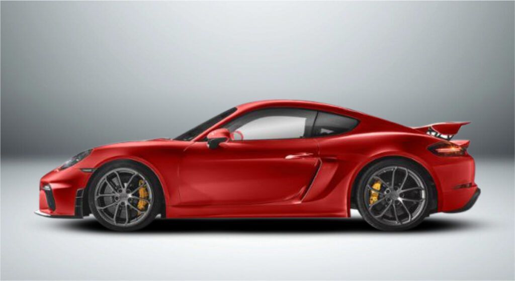 Um porsche 911 gt4 rs vermelho está sentado em uma superfície branca.