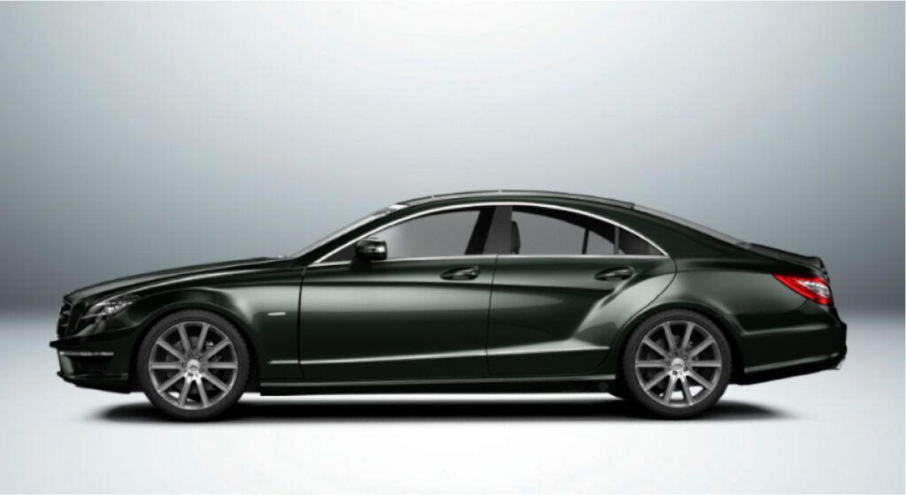 Um mercedes benz cls preto está sentado em uma superfície branca.