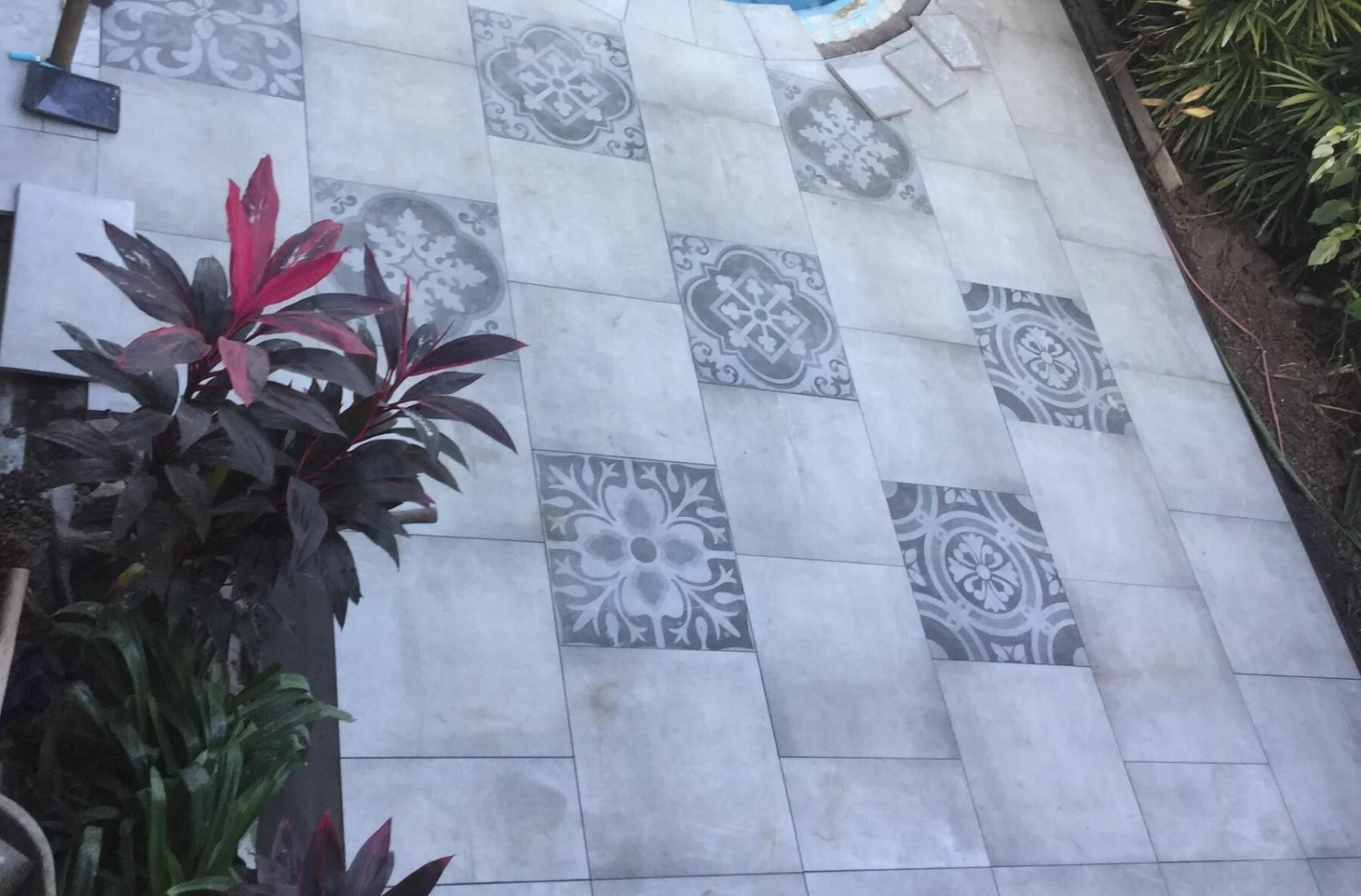 Floor Tiles with Design and Small Plants Beside — Paving in Darwin River, NT