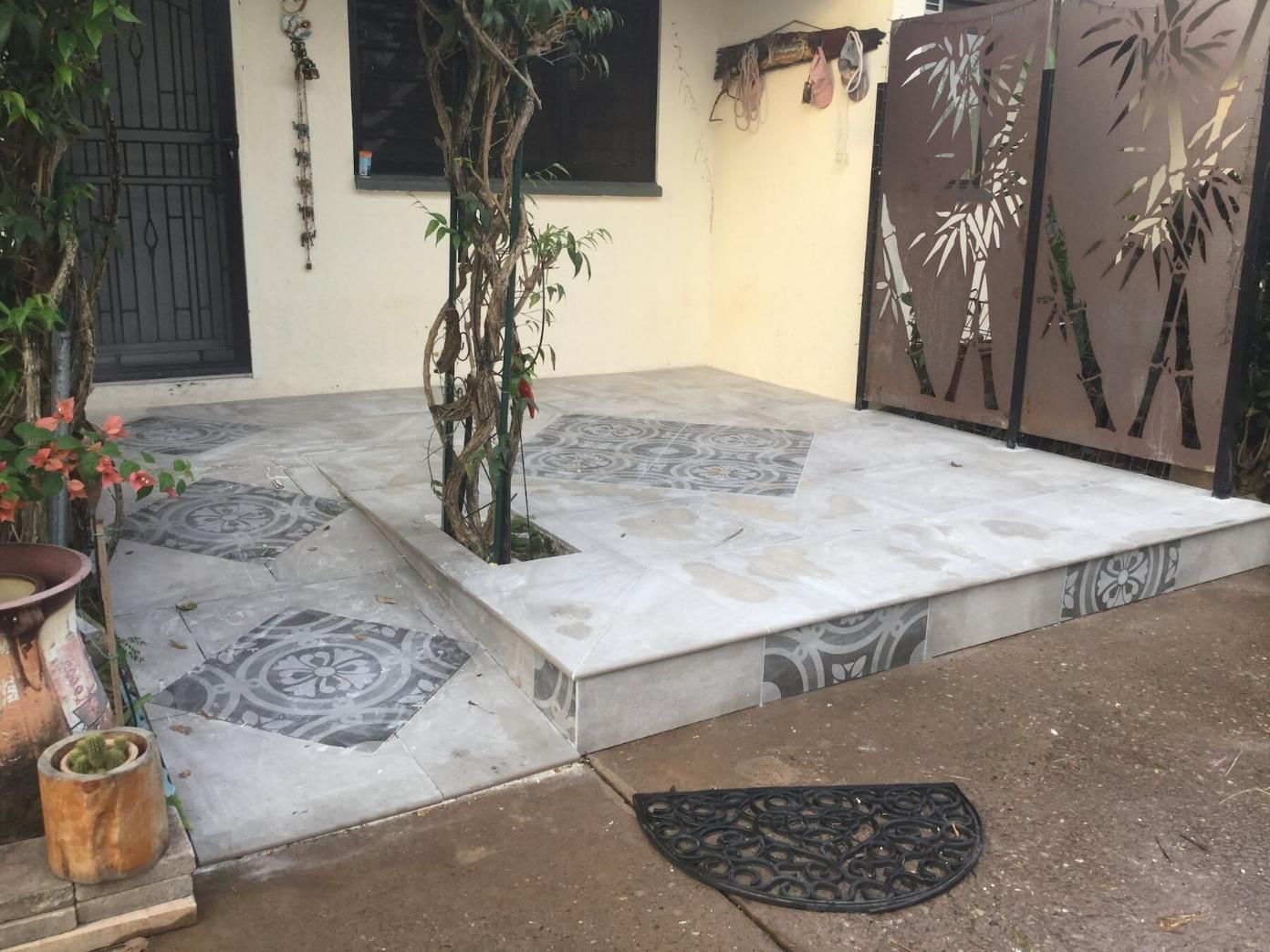 Grey Pave Tiles With Black Designs — Paving in Darwin River, NT