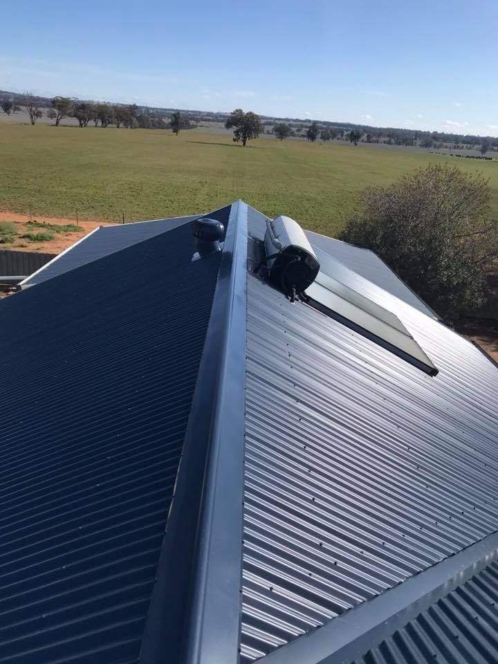 The Roof Of A House Has A Solar Panel On It — Matt Walsh Plumbing in Thurgoona, NSW