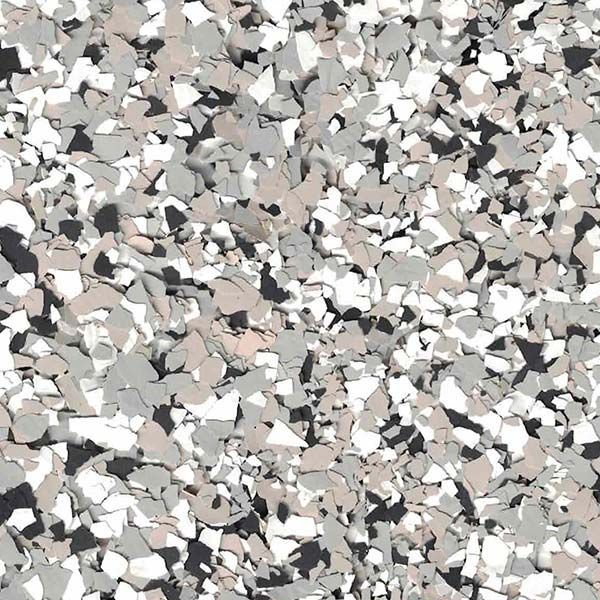 Abstract pattern of scattered white, gray, black, and beige pebbles or confetti-like fragments