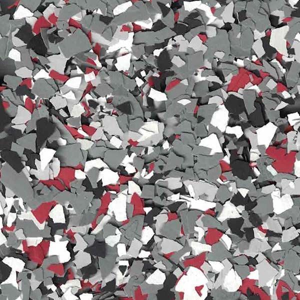 Abstract mosaic of small gray, white, black, and red irregular shapes