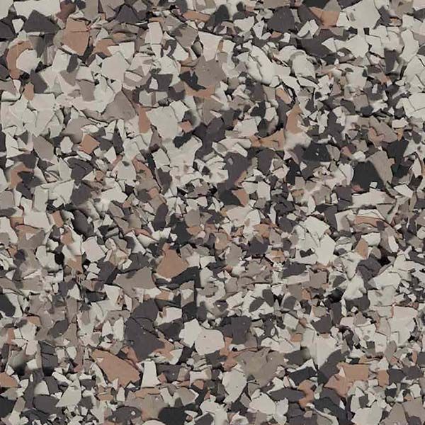 Close-up of a confetti-like pattern and in gray, tan, and pink tones