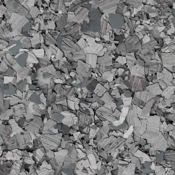 Gray and silver confetti-like pattern filling the frame, creating a rough, textured surface