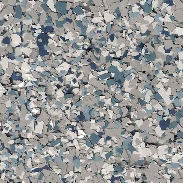 Abstract pattern of small gray, white, and blue pebbles or confetti-like fragments