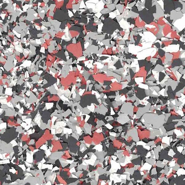 Abstract gray, white, and coral camouflage-like pattern made of scattered angular shapes.