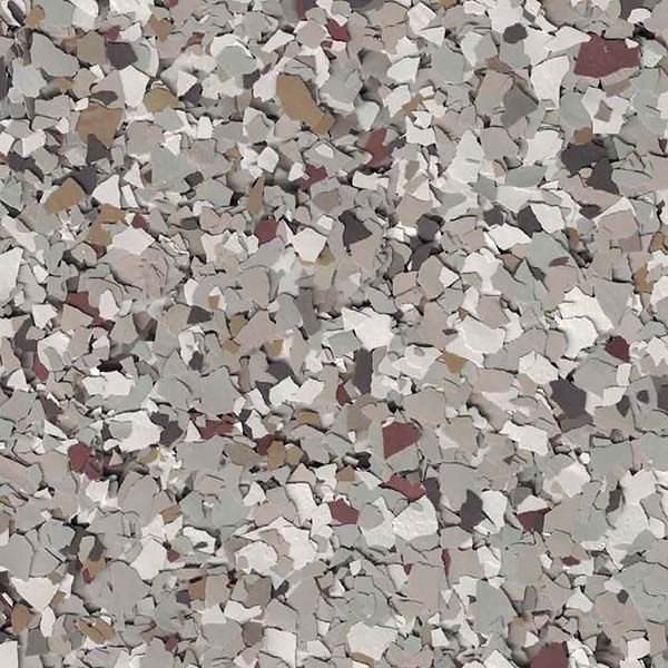 Gray, white, and beige speckled terrazzo or stone chip surface close-up